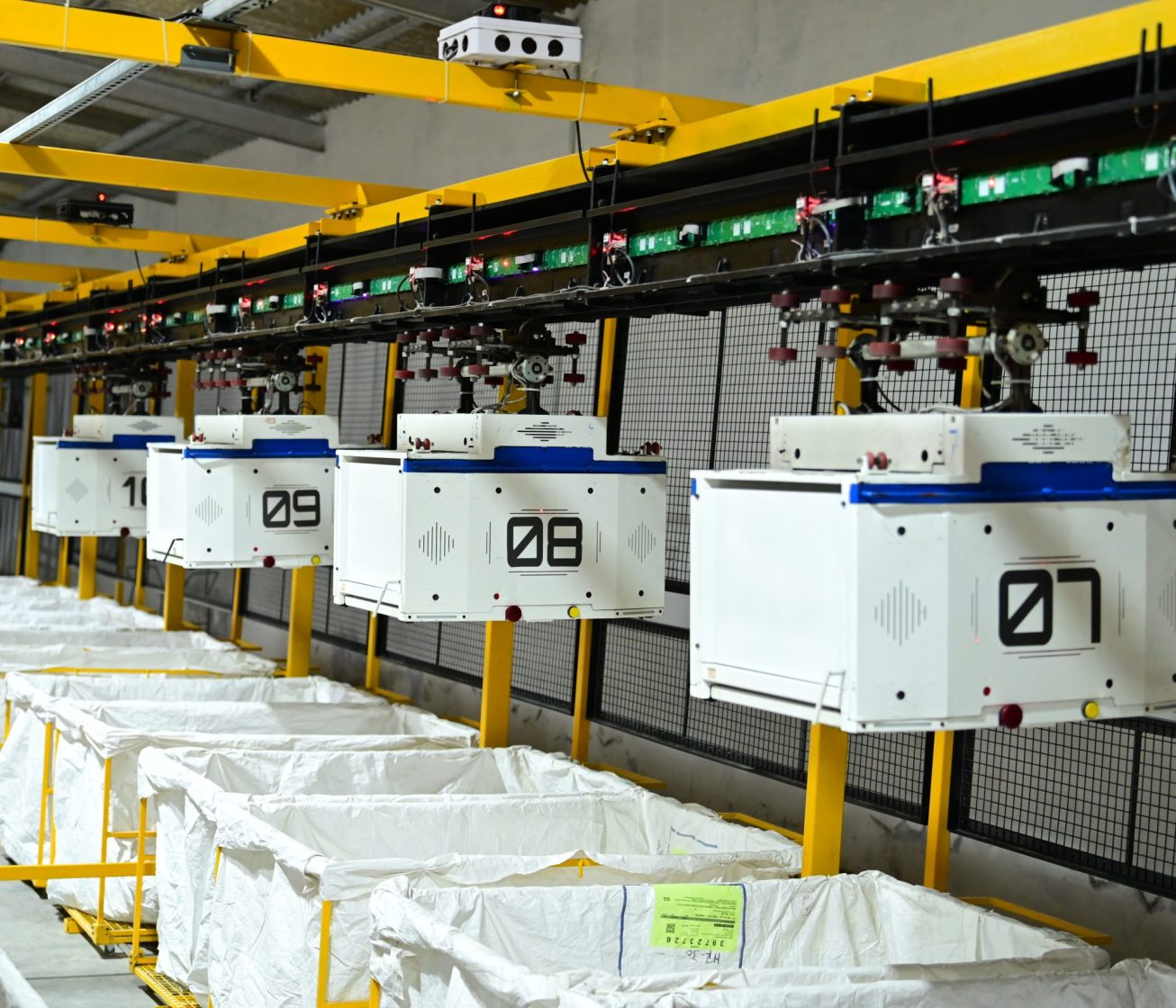mSort automated sorting system used for package sorting and material handling in warehouse operations.