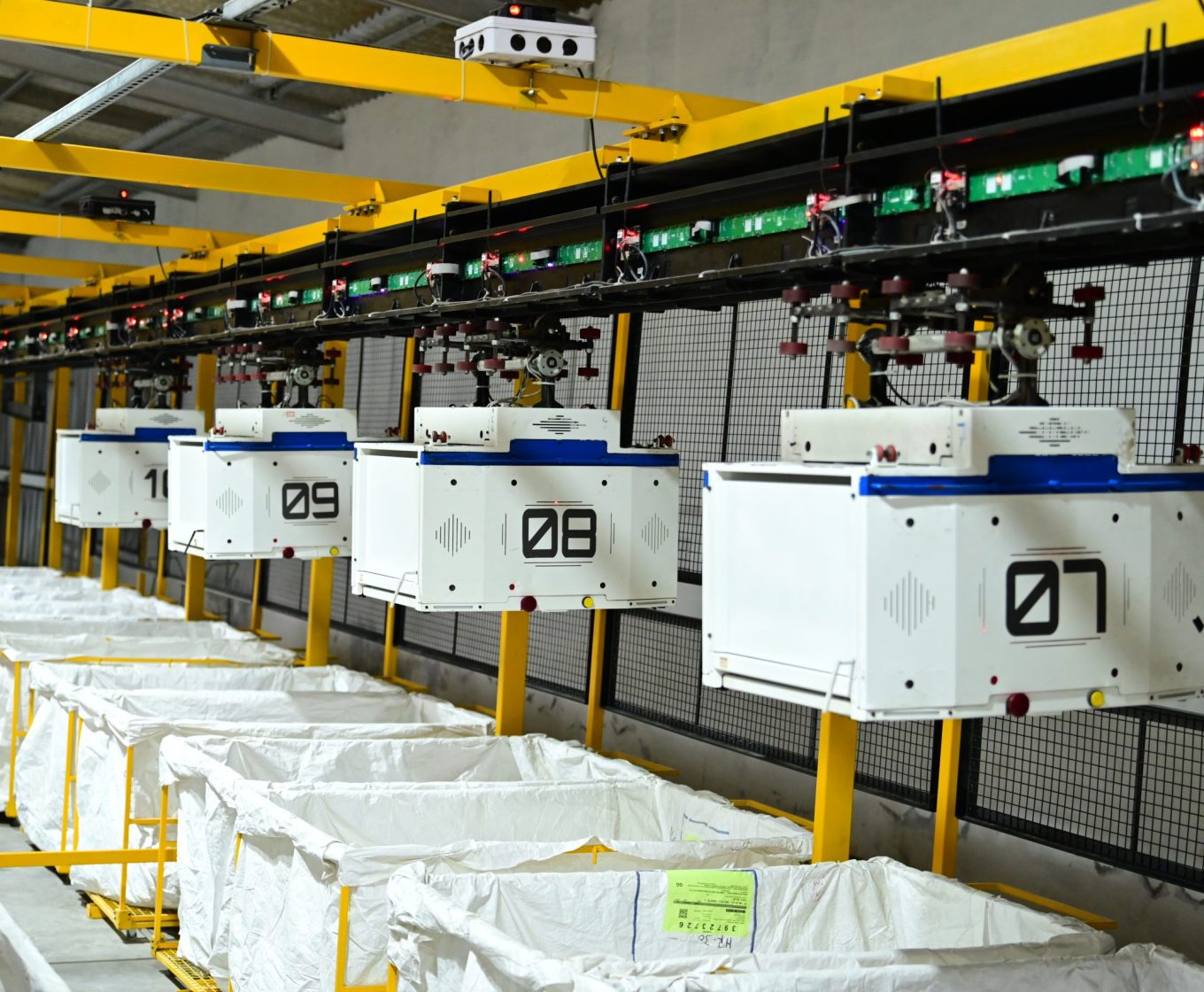 mSort automated sorting system used for package sorting and material handling in warehouse operations.