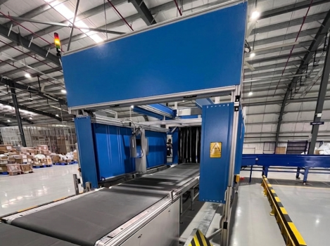 DWS machine used for SKU profiling with automated dimensioning and weighing in warehouse and logistics operations.